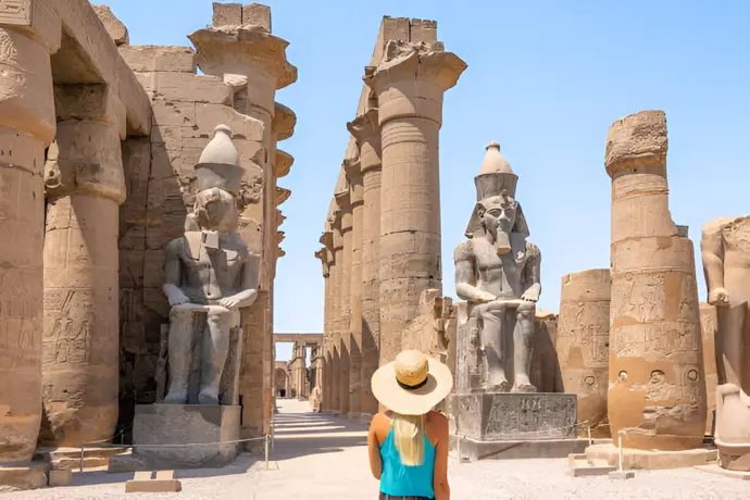 Luxor Temple at sunset, showcasing its grand facade and obelisk in Egypt