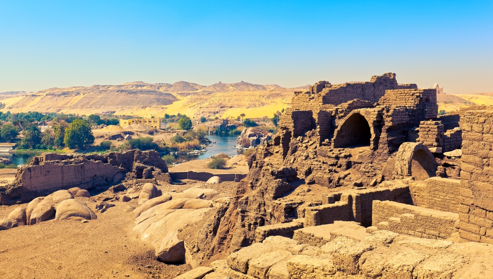 Sunrise over the Nile River near Luxor with temple 